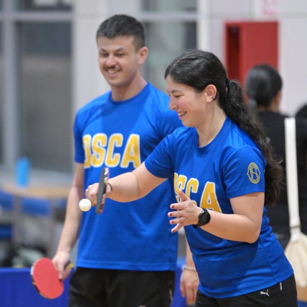 Katie and Matthew Wong get paddles ready for table tennis at the games at the Edgar Centre. 