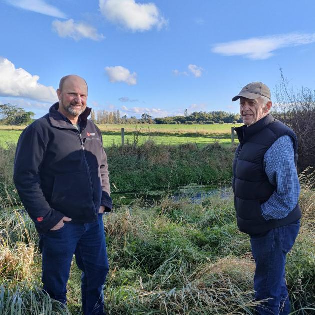 Geoff Spark (left) and his uncle Richard Spark next to North Brook Stream. The proposed North...