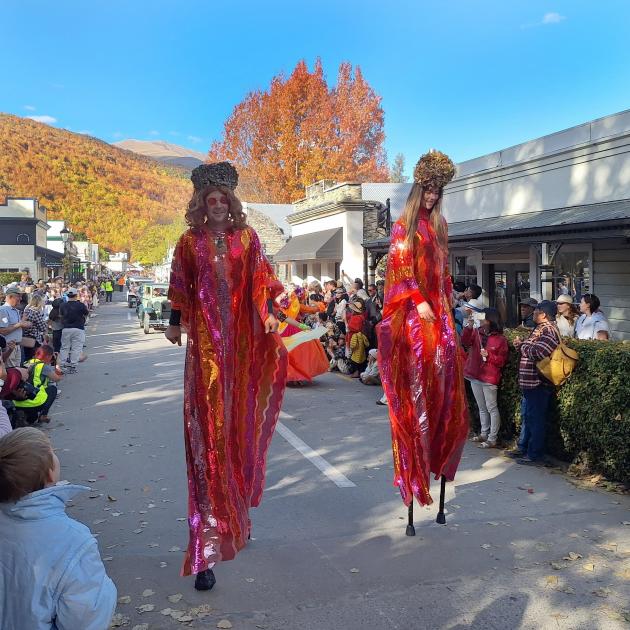 These stilt walkers captivated the crowds during the Arrowtown Autumn Festival street parade....