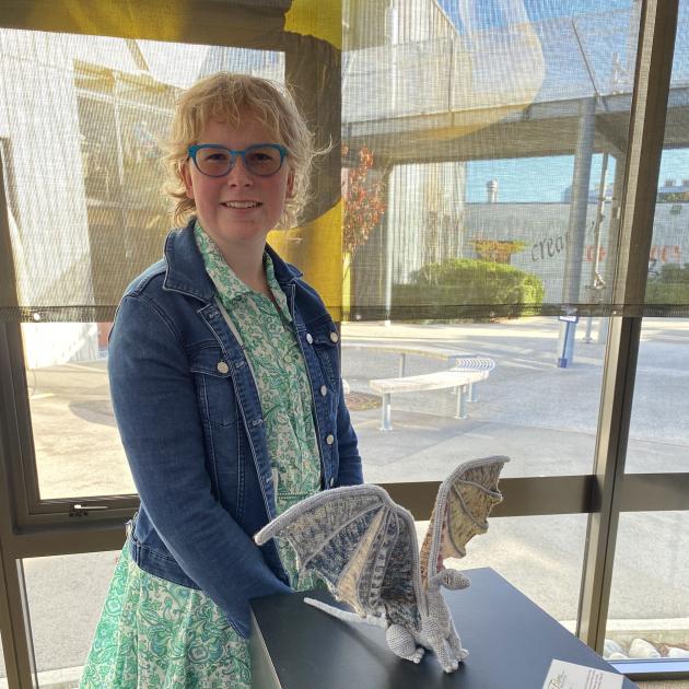 With her crocheted Advent Dragon at the Creative Fibre Exhibition in Christchurch last Month is...