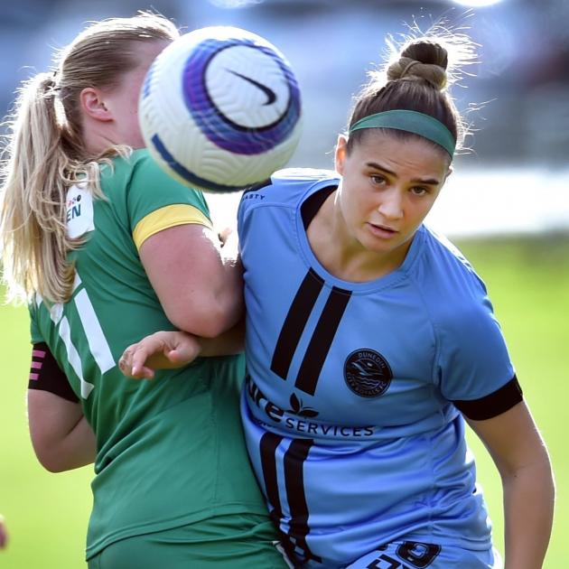 Green Island’s Amelia Caltaux (left) and Dunedin City Royals’ Katerina Kiousis battle for the...