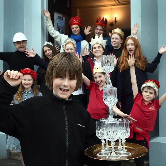 Ruben Escott, 10, of Dunedin, leads celebrations at the Playhouse Theatre over funding for...