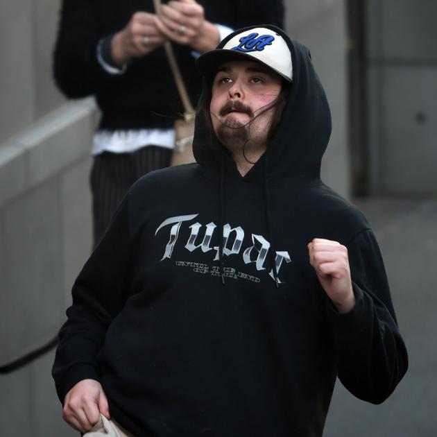Cory Gilliand-Dickson outside the Dunedin District Court after admitting ill-treatment of a...