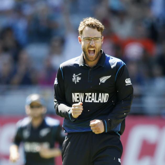 New Zealand's Daniel Vettori celebrates dismissing Australia's Steven Smith during their Cricket...