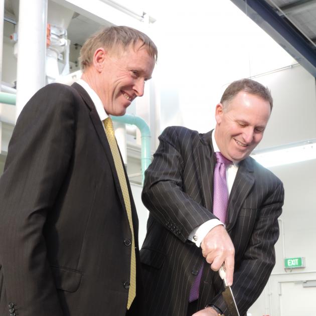 Chairman Murray Turley (left) and then-Prime Minister John Key at the 2013 opening of Washdyke’s...