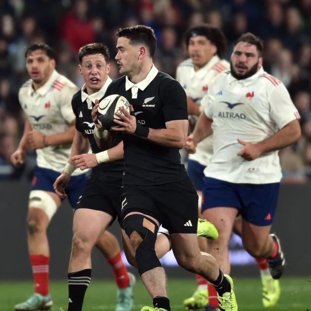 Any All Blacks backline will be built around Will Jordan (with ball) and Cam Roigard.