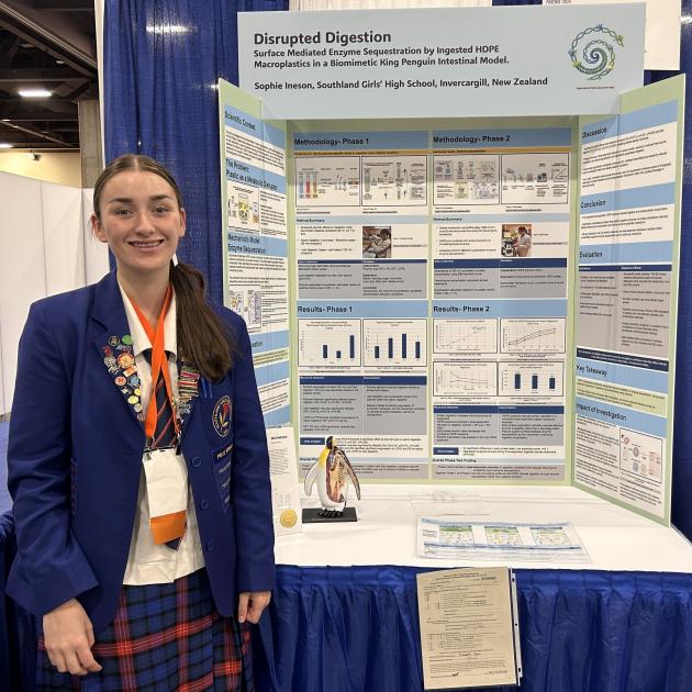 Southland Girls' High student Sophie Ineson stands with her project about the chemical impact of...