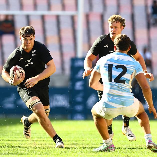 Finn McLeod takes the ball into contact for New Zealand against Argentina in the under 20 Rugby...
