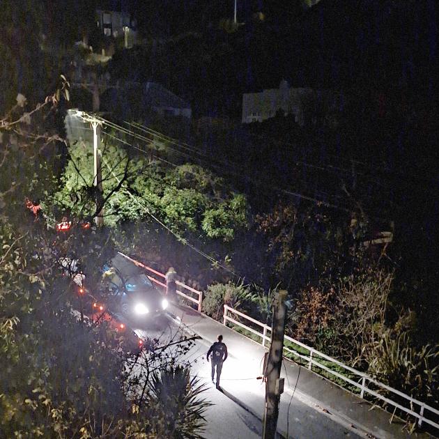 Police tow a car in Dunedin for forensic analysis. PHOTO: SUPPLIED