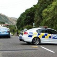 A cordon remains in place at the scene where two bodies were found in Paekakariki this morning. Photo / APNZ