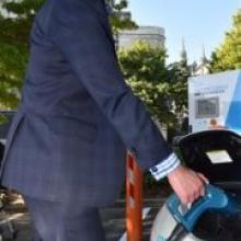 Delta Utility Services chief executive Grady Cameron tries  the new electric vehicle rapid charger in Filleul St, Dunedin, yesterday. Photo by Gregor Richardson.