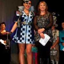 Kate Morrison (left) models Judy Powell's (right) supreme winning entry Out of Strength Comes Beauty at a wearable arts awards show on Saturday night. Kate Morrison (left) models Judy Powell's (right) supreme winning entry Out of Strength Comes Beauty at a wearable arts awards show on Saturday night.