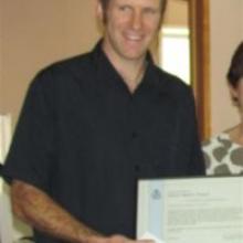Constable Paul Mander, of Omarama, holds his New Zealand Police Silver Merit Award yesterday. Photo by Ben Guild.
