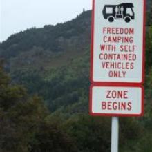 The first sign advising visiting freedom campers of new restrictions in the Queenstown Lakes district has gone up  near Sunshine Bay in Queenstown, with the rest to follow in the next two weeks. Photo by Joe Dodgshun.