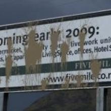 The Five Mile Village development advertising signs that has been the object of repeat vandalism.  Photo by Chris Morris