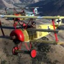 The Upper Clutha skies have hummed with aircraft, such as this pair of World War 1 replica Fokker Triplanes. Photo by Gavin Conroy.