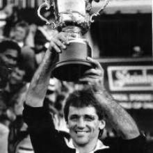 All Black captain David Kirk hold the World Cup aloft in in Auckland in 1987. 