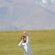 Pakistan bowler Yasir Arafat winds into his delivery stride against the New Zealand Invitation XI at the Queenstown Events Centre yesterday