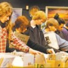 Enjoying the Regent Theatre's first Anything But Books sale are, from left, Manu Braithwaite, Sarah Claman, Dylan Gaffney, Michael Gaffney, Tokerau Wilson, Paul Lynch and Alex Barker. Photo by Peter McIntosh.