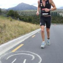 Challenge Wanaka winner Jimmy Whyte had plenty to smile about once he reached the finish line to win his first 226km triathlon title in only his second attempt at the long-distance event. Photo by Matthew Haggart
