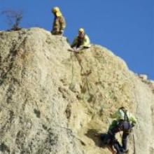 Cromwell Volunteer Fire Brigade's line rescue crew lowers Carter Pearson to safety.