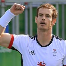 Andy Murray of Britain celebrates after winning his match against Steve Johnson (USA). Photo:...