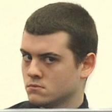 Alexander James William Merritt sits in the dock during his sentencing in the Dunedin High Court...