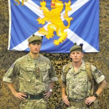 Members of the Highlanders 4th Battalion, The Royal Regiment of Scotland Captain M. L. Rupasinha ...