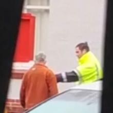A still from a video shows a security guard and an man arguing over skip access yesterday. IMAGE:...