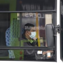 Dunedin bus drivers at work yesterday. Most wore masks, but some have exemptions from doing so....