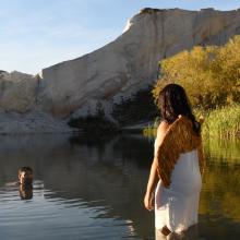 Christopher Ulutupu takes a swim at St Bathans, watched by his sister Fame Ulutupu in her angel...