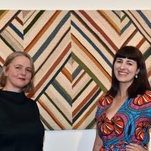 Curators Elle Lou August (left) and Jane Groufsky in front of Margery Blackman’s From Aramoana....