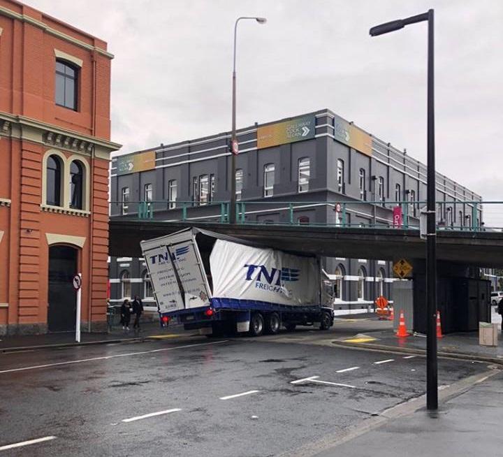 Truck stuck under Dunedin overpass