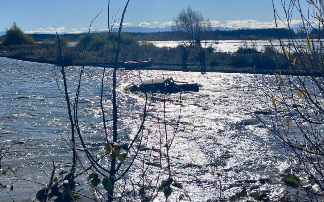 Rescuers waited to rescue man and dogs stranded in middle of flooded Canterbury river