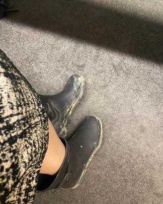 The prime minister walked through parliament in her muddy gumboots. Photo: Jacinda Ardern