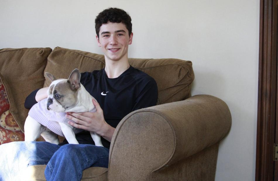 Tāmati Graham is enjoying catching up with family, including dog Ava, while he is home...