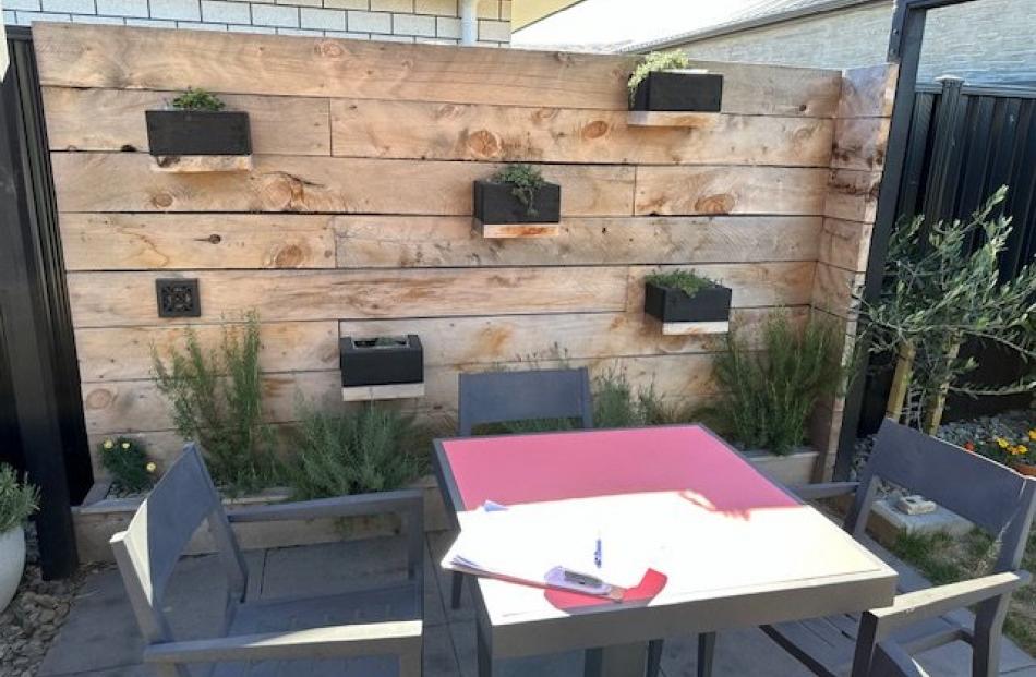 The garden may be tiny and dry, but Cromwell gardener Tracey Grose has found places for plants in...