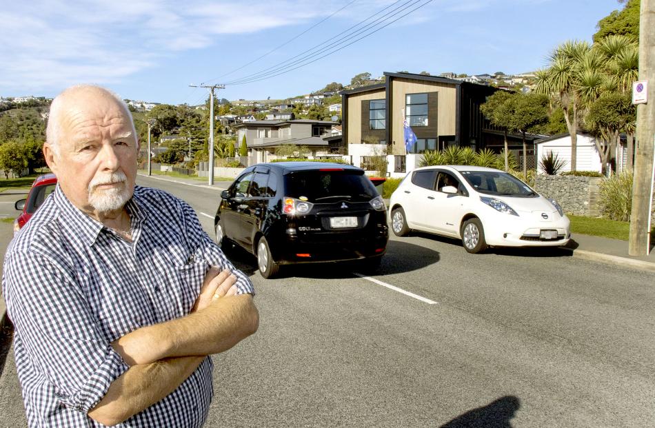 Derek McCullough said cars parking on both sides of McCormacks Bay Rd made the road narrow for...