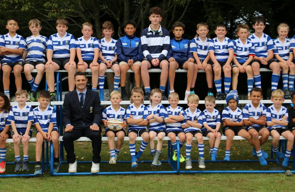 Southbridge juniors with club legend Dan Carter. The junior sides were the first to take the...