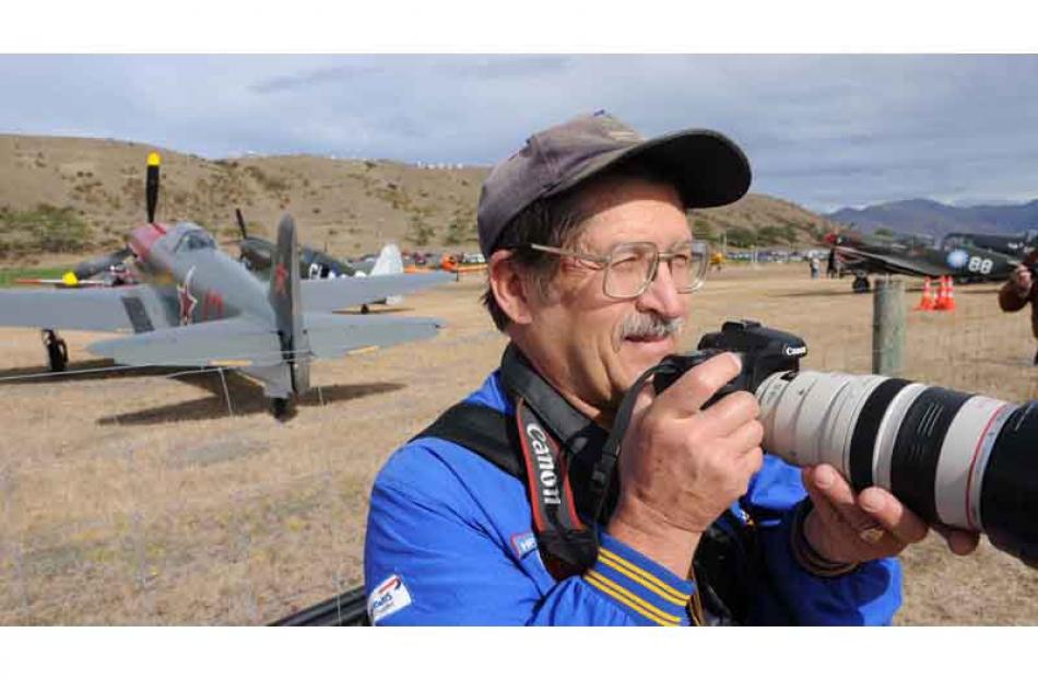 Wol Nelowkin on his way to shooting an estimated 3 000 images during Wanaka warbirds.