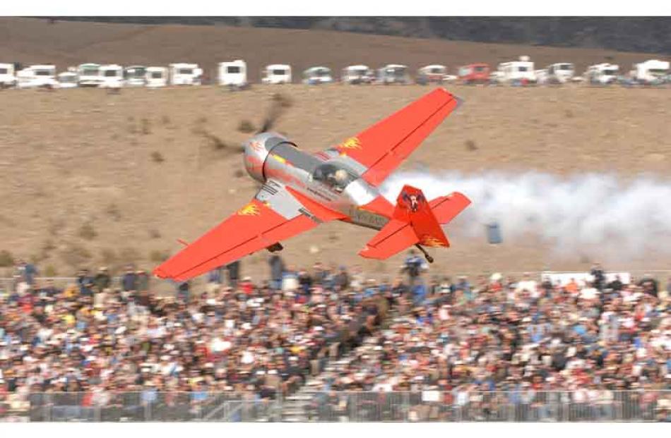 Jurgis Kairys slips past at a seeminly impossible angle in the Juka aircraft which he designed....