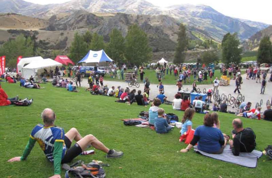Crowds gathered on the hill above the finish line to enjoy the action and winery views.