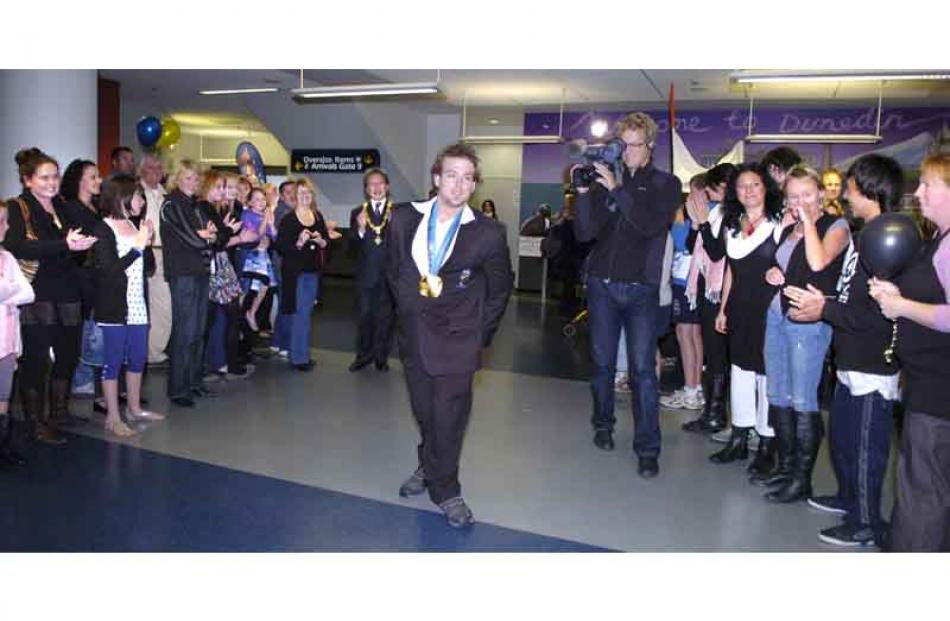 Adam Hall arrives at Dunedin airport