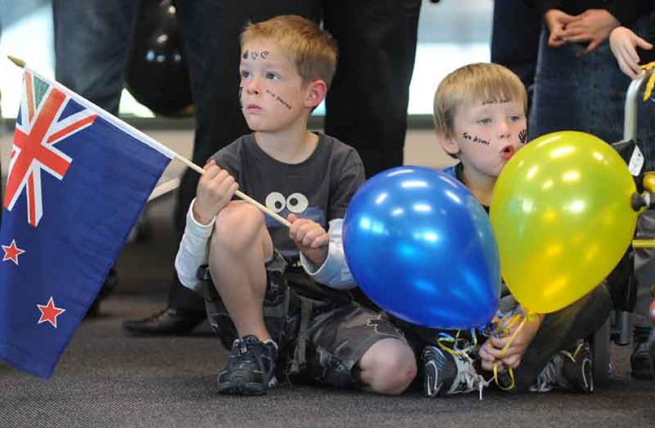 Children from left Ethan Moss,6  of Queenstown and Ezra Holmes, 5 of Outram School welcolme  Adam...