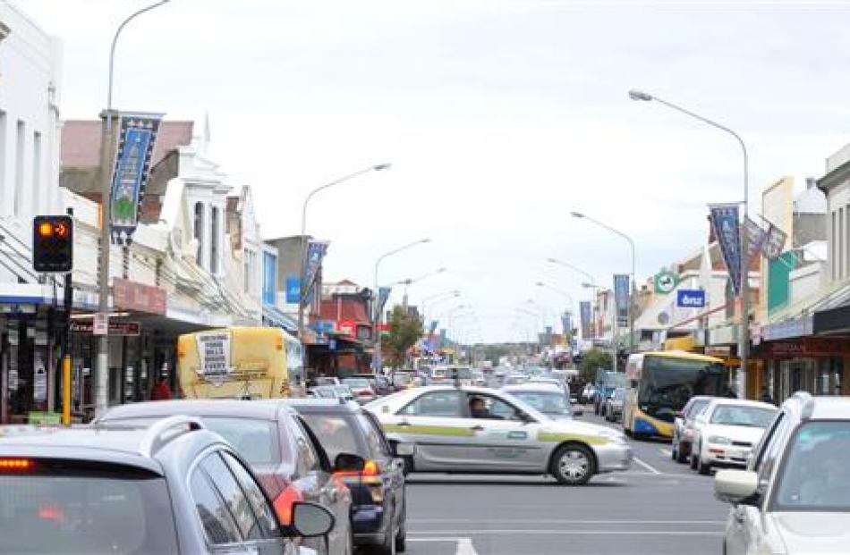 Cars cross a busy King Edward St in South Dunedin yesterday. The Dunedin City Council has...