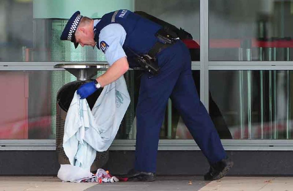 Police search the airport during a bomb scare at Dunedin International Airport.