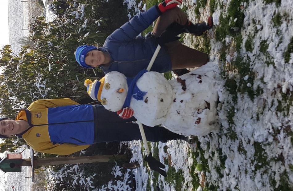 Jared and Thomas Gibson are loving the day off school. Photo: Jackie Gibson