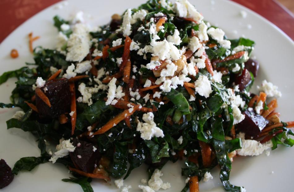 Add carrots, roasted beetroot, almonds and crumbled goat's cheese into the mix. Photo: Copyright 2016 Emily Grosvenor
