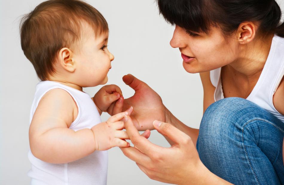 It's important to talk to your baby, as the language part of their brain is developing from the moment they hear voices. Photo: Getty Images 