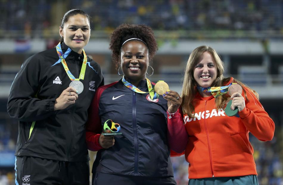 From left: Medallists Valerie Adams, Michelle Carter and Anita Marton. Photo: Reuters 